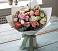 Букет цветов из: Розы, Лизиантусы и Гвоздики в Васильевском Моху